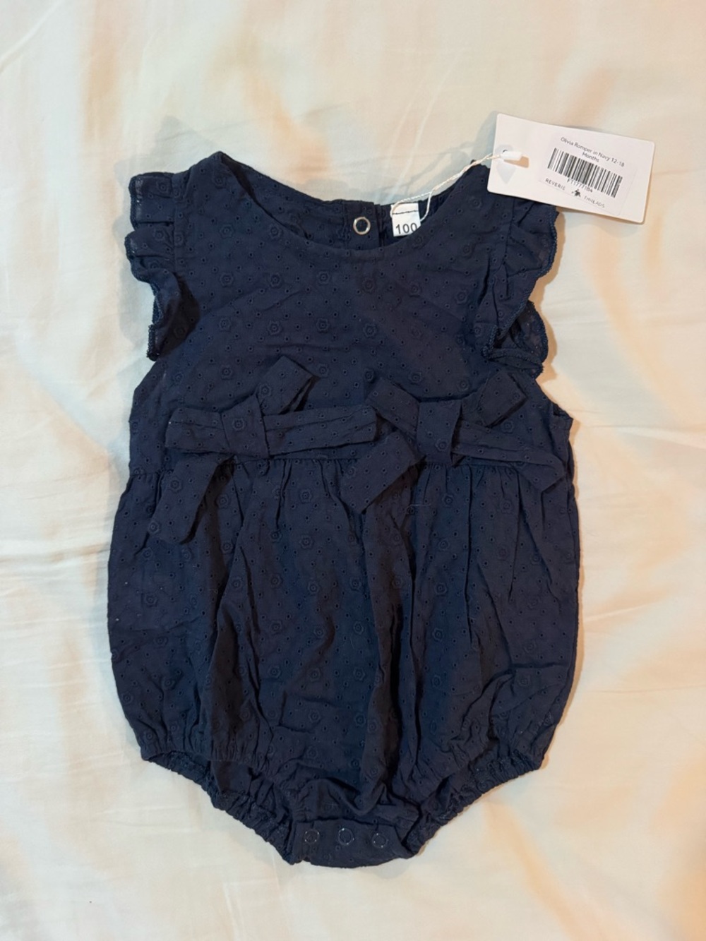 Navy Eyelet Baby One-Piece with Bow Details